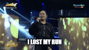 a woman singing into a microphone with the words i lost my run written below her