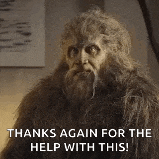 a bigfoot with a beard is sitting on a couch and says `` thanks again for the help with this ! ''