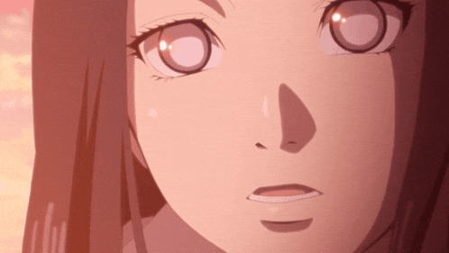 a close up of a girl 's face with a surprised look