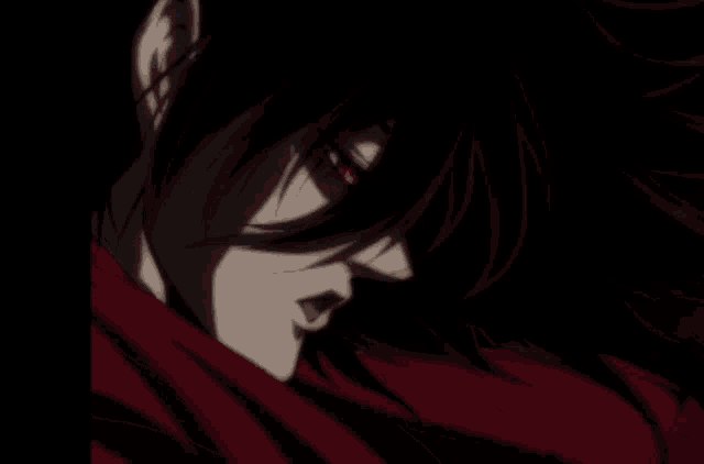 a close up of a person 's face with red eyes and black hair
