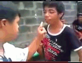 a boy wearing a shirt that says ' i 'm sorry ' on it