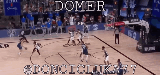 a basketball game is being played on a court with the word domer on the top