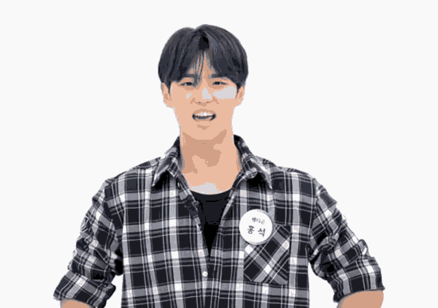 a man wearing a black and white plaid shirt has a name tag on his chest