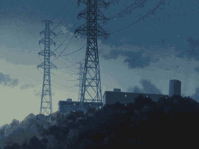 a blue sky with power lines in the foreground and a building in the background