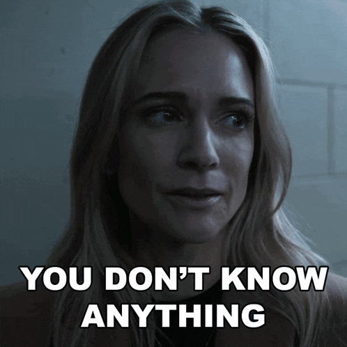 a woman says " you don 't know anything " in front of a brick wall