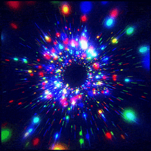a bunch of colorful lights are coming out of a black hole