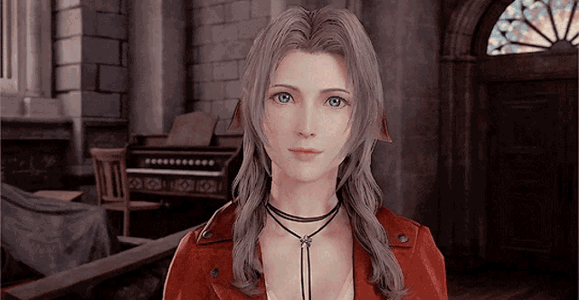 a woman in a red jacket stands in a room with a piano in the background