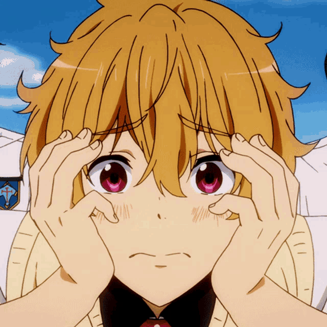 a close up of a person 's face with their hands covering their eyes