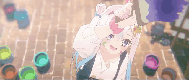 a girl with white hair and blue eyes is holding a bucket of paint in her hand .