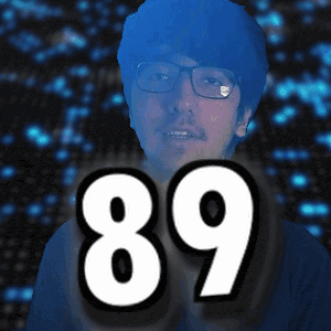 a man with glasses and the number 89 in front of his face