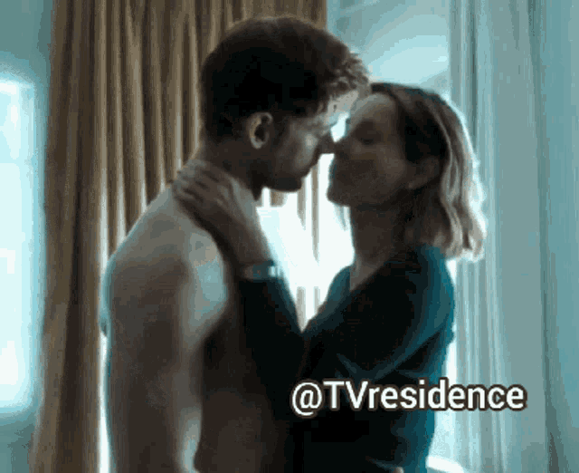 a picture of a man and woman kissing with the words @tvresidence at the bottom