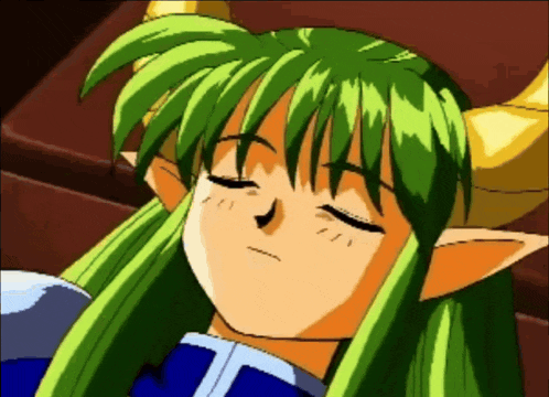 a cartoon girl with green hair and horns is sleeping