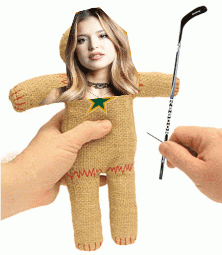 a person holding a stuffed doll with a picture of a woman on it