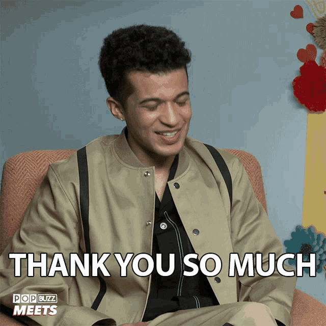 a man sitting in a chair with the words thank you so much on the bottom