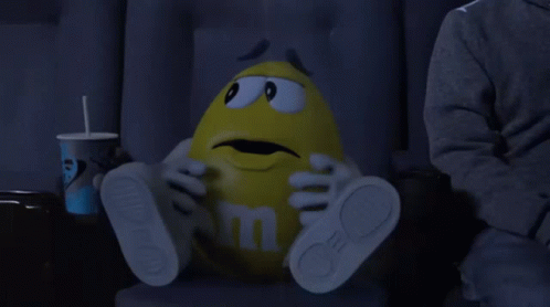 M And Ms Yellow GIF - M And Ms Yellow Jump Out Of Seat GIFs