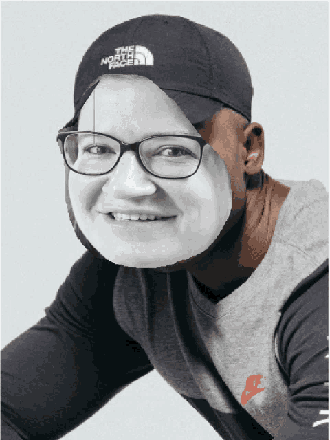 a man wearing a hat that says the north face