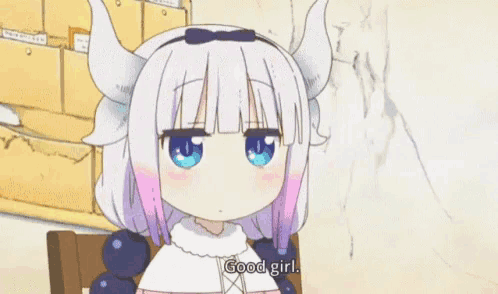 a girl with horns is sitting in a chair and looking at the camera