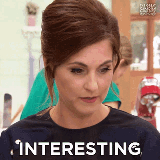a woman says interesting in front of a mixer