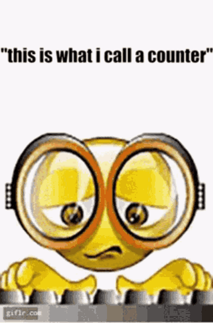 a cartoon smiley face wearing glasses is typing on a computer keyboard .