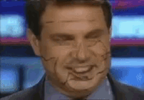 a close up of a man 's face with a smiley face