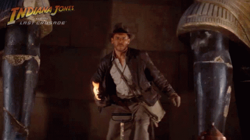 Throw The Torch Indiana Jones GIF