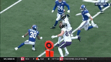 a football game is being played on a television screen .