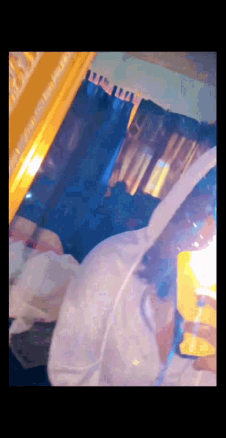 a person is taking a selfie in front of a mirror