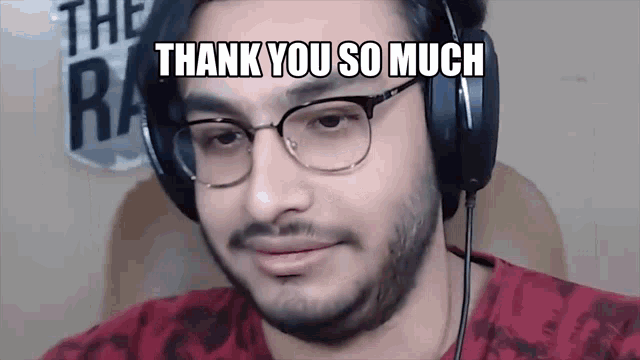 a man wearing glasses and headphones is saying thank you so much