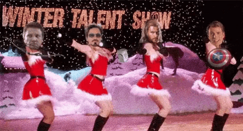 a group of people dressed in santa outfits are dancing in front of a winter talent show sign