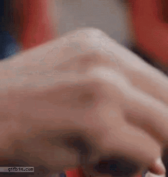 a close up of a person 's hand with a gifbin.com watermark on the bottom