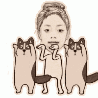 a woman is surrounded by three cats holding her face .