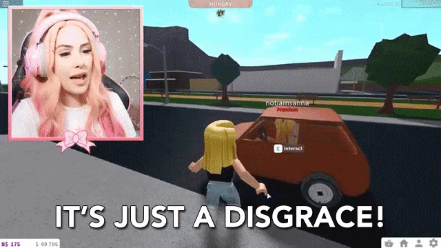 a girl playing a video game with the words it 's just a disgrace on the bottom