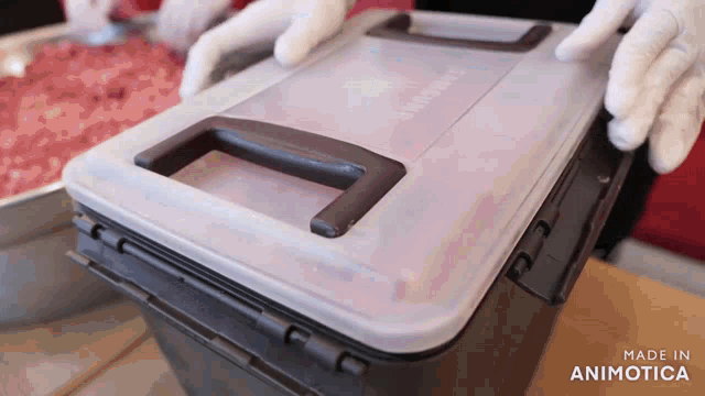 a person is holding a plastic container that says samsung on it
