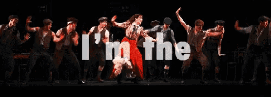 a group of people are dancing in front of the words i 'm the