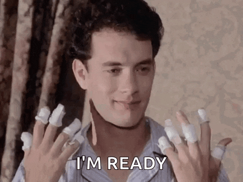 a man with a lot of bandages on his fingers is ready to go .