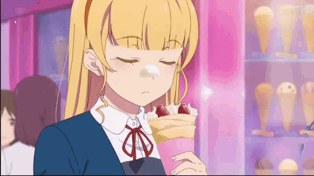 a blonde anime girl is eating a crepe with strawberries and whipped cream .