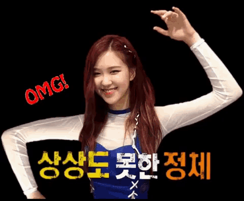 a girl with red hair is smiling and giving the ok sign
