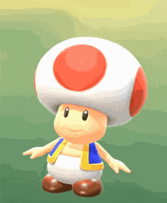 a toad with a red circle on his head is standing on a green field .