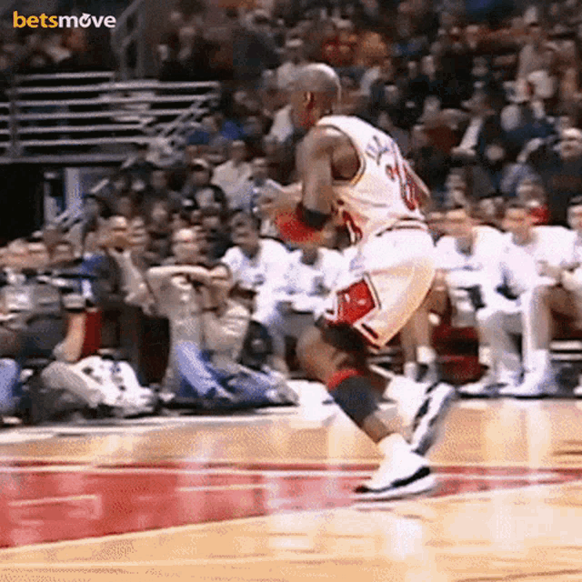 a basketball player in a white jersey with the number 10 on it