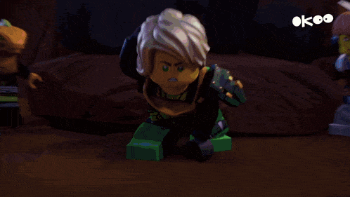 a group of lego characters are standing in a cave with a green light coming out of the ground