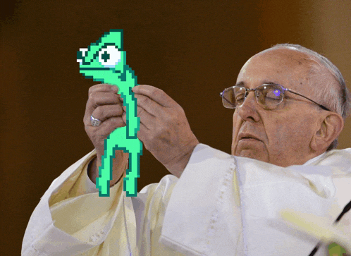 a man in glasses holds a green pixelated lizard with the number 50 on its head