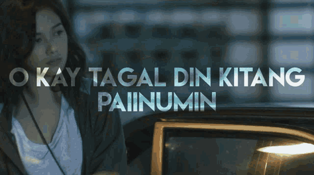 a blurred image of a woman in a car with the words " okay talaga din kitang pipilin "