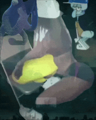 squidward from spongebob squarepants is holding a yellow sponge in his hand
