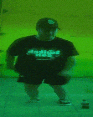 a person wearing a black shirt that says daft punk club