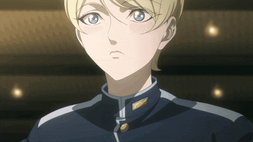 a boy with blonde hair and blue eyes is wearing a blue and white uniform
