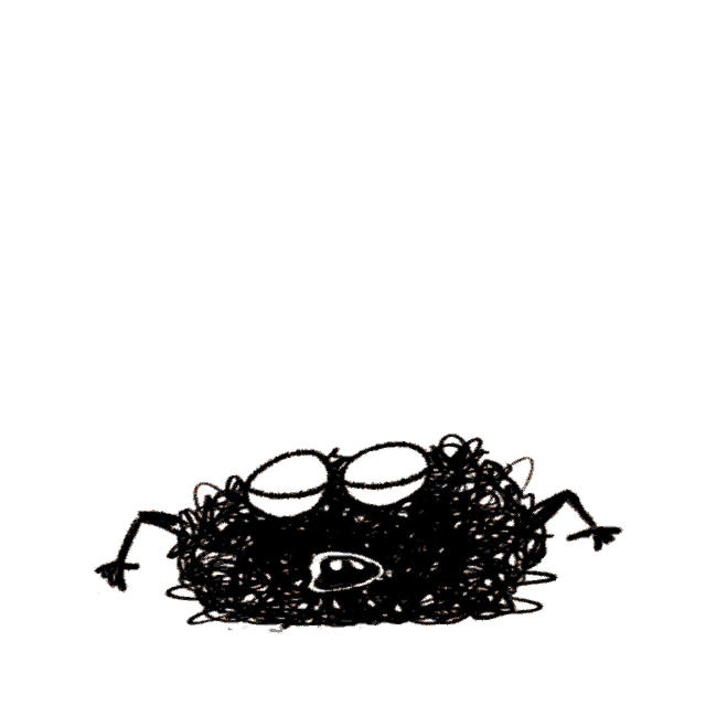a black monster with orange hearts in its eyes