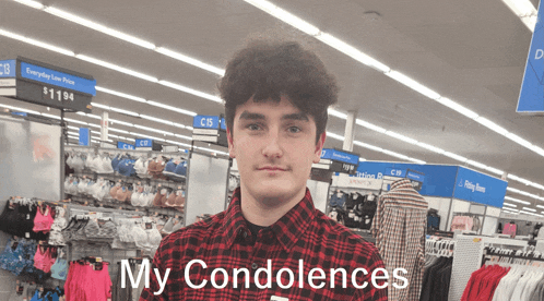 a man in a plaid shirt stands in a store with the words my condolences written on the bottom