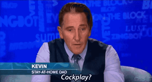 a man with a name tag that says kevin stay at home dad cockplay