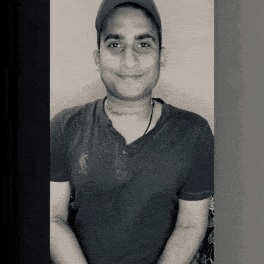 a black and white photo of a man wearing a polo shirt