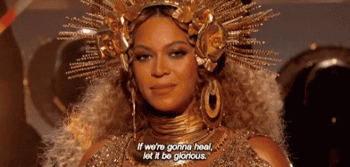 a close up of a woman wearing a gold crown and earrings and a quote .
